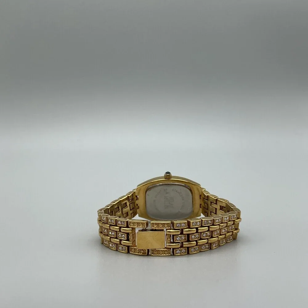Nolan Miller Womens Watch 23mm MOP Dial Gold Tone Crystals New Battery 6.25